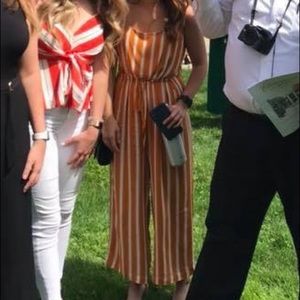 Orange and white striped jumpsuit